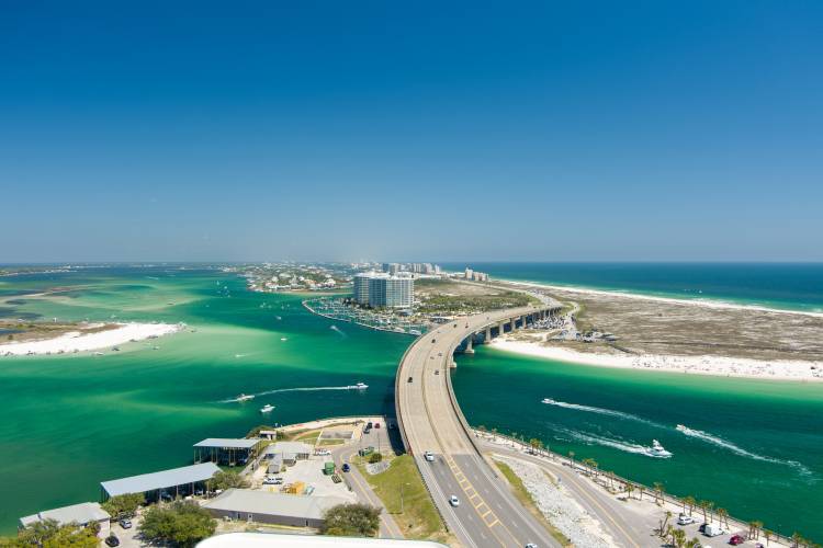 overhead photo of orange beach Alabama showing blue-green waters and coast area